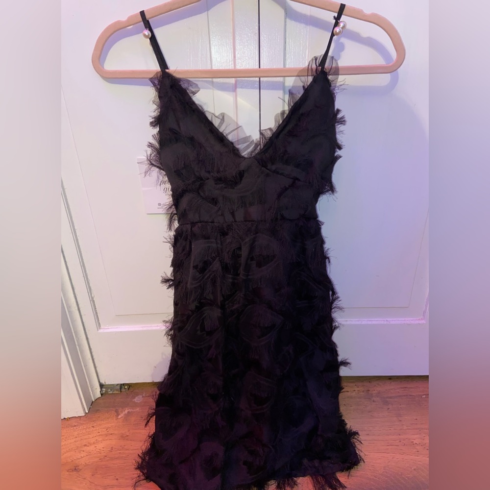 black boutique dress with pearls on the straps!